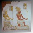 A painting on the wall of an unknown tomb at Tuna el Gebel shows Isis and Osiris seated on their thrones. Egypt, November 1962. 